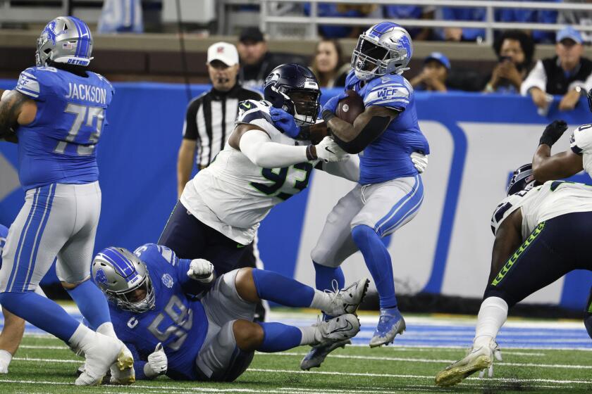 Lions pass rush never gets started in 37-31 loss to Seahawks - The San  Diego Union-Tribune