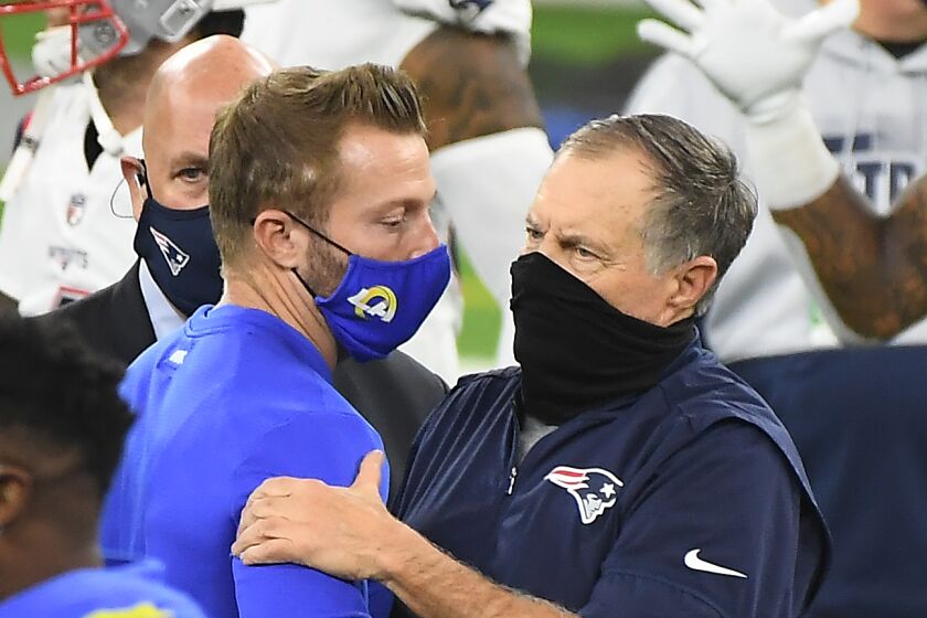 Rams head coach Sean McVay and Patriots head coach Bill Belichick shake ands after the Rams victory at SoFi Stadium Thursday.