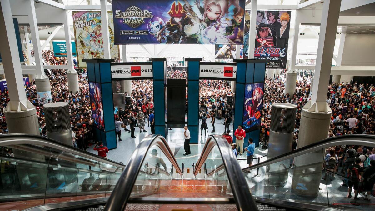 A huge crowd awaits the opening of the Anime Expo 2016 in Los Angeles.