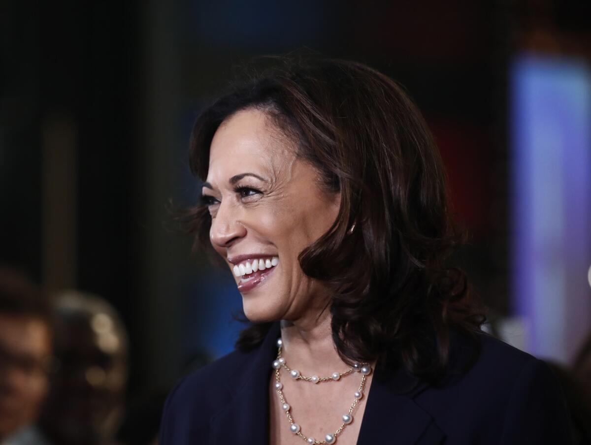Sen. Kamala Harris (D-Calif.) listens to questions after the Democratic presidential primary debate hosted by NBC News on Thursday in Miami.