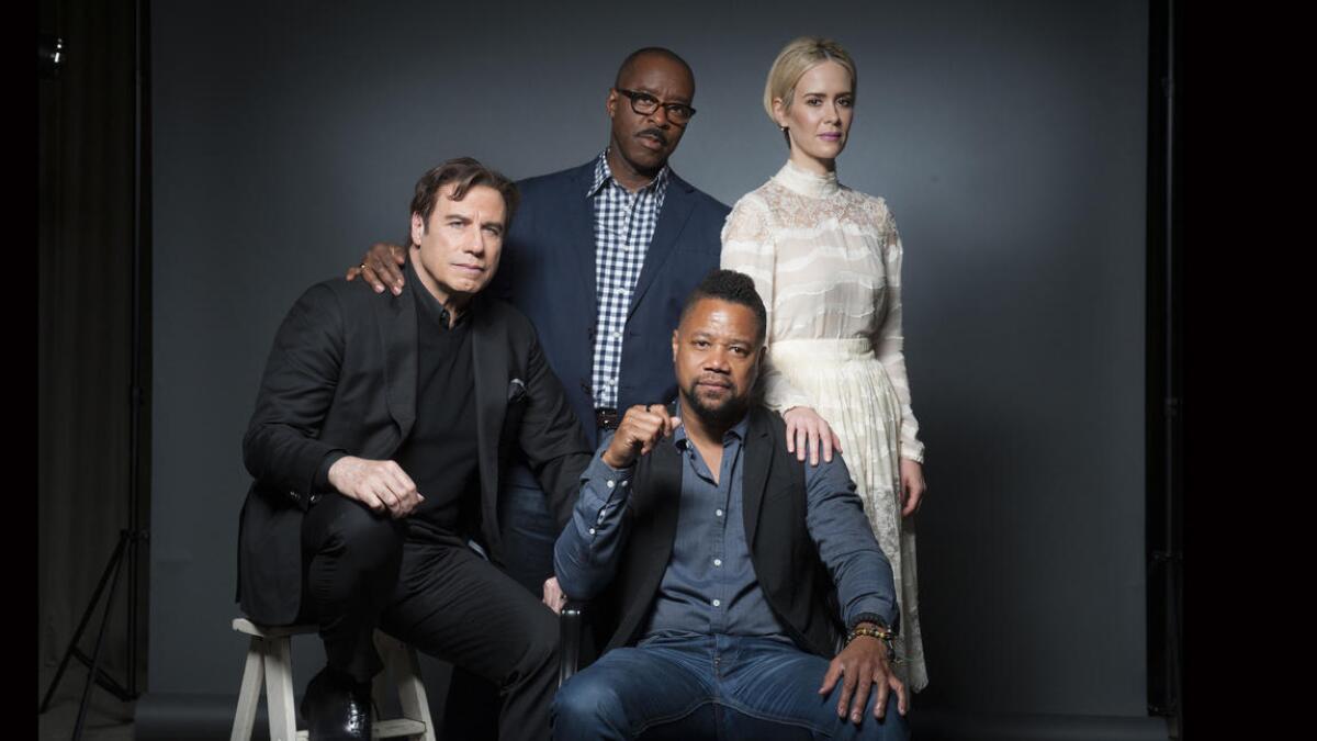 Clockwise from left, actors John Travolta, Courtney B. Vance, Sarah Paulson and Cuba Gooding Jr. star in "The People v. O.J. Simpson: American Crime Story."