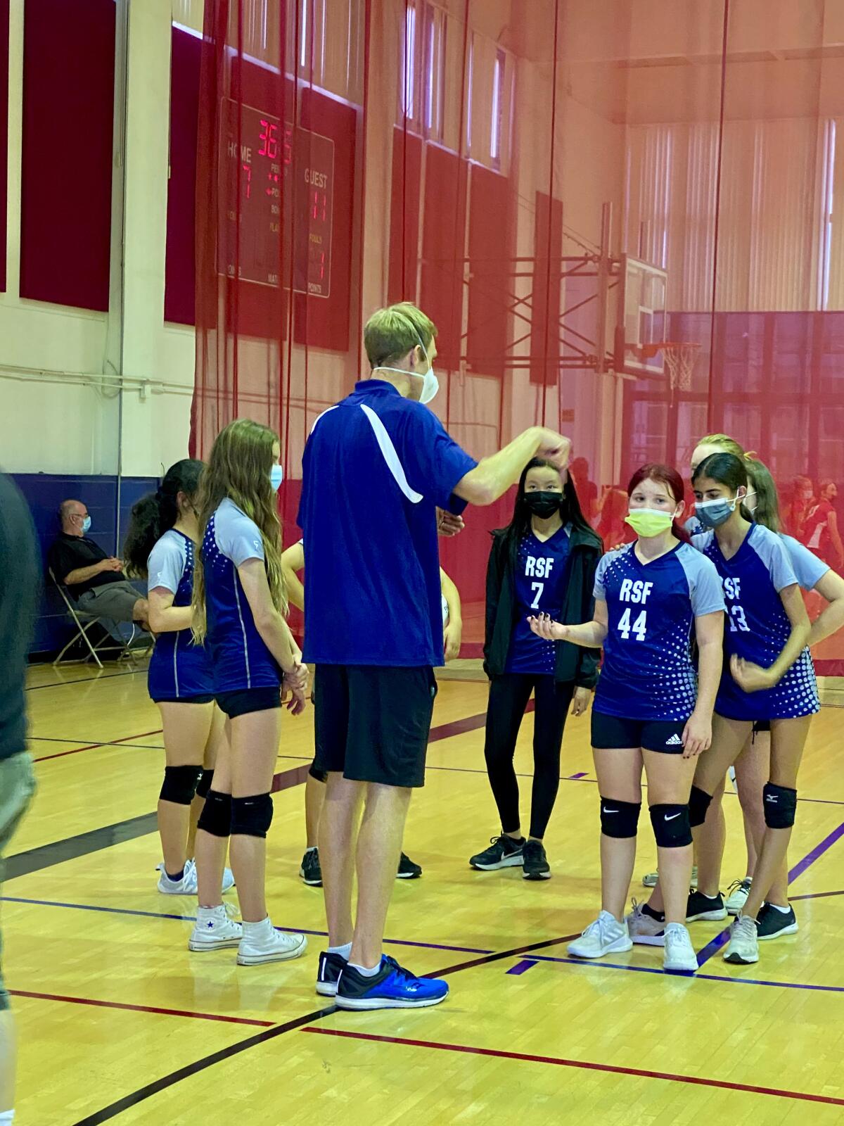 Coach Brown talking to his team.