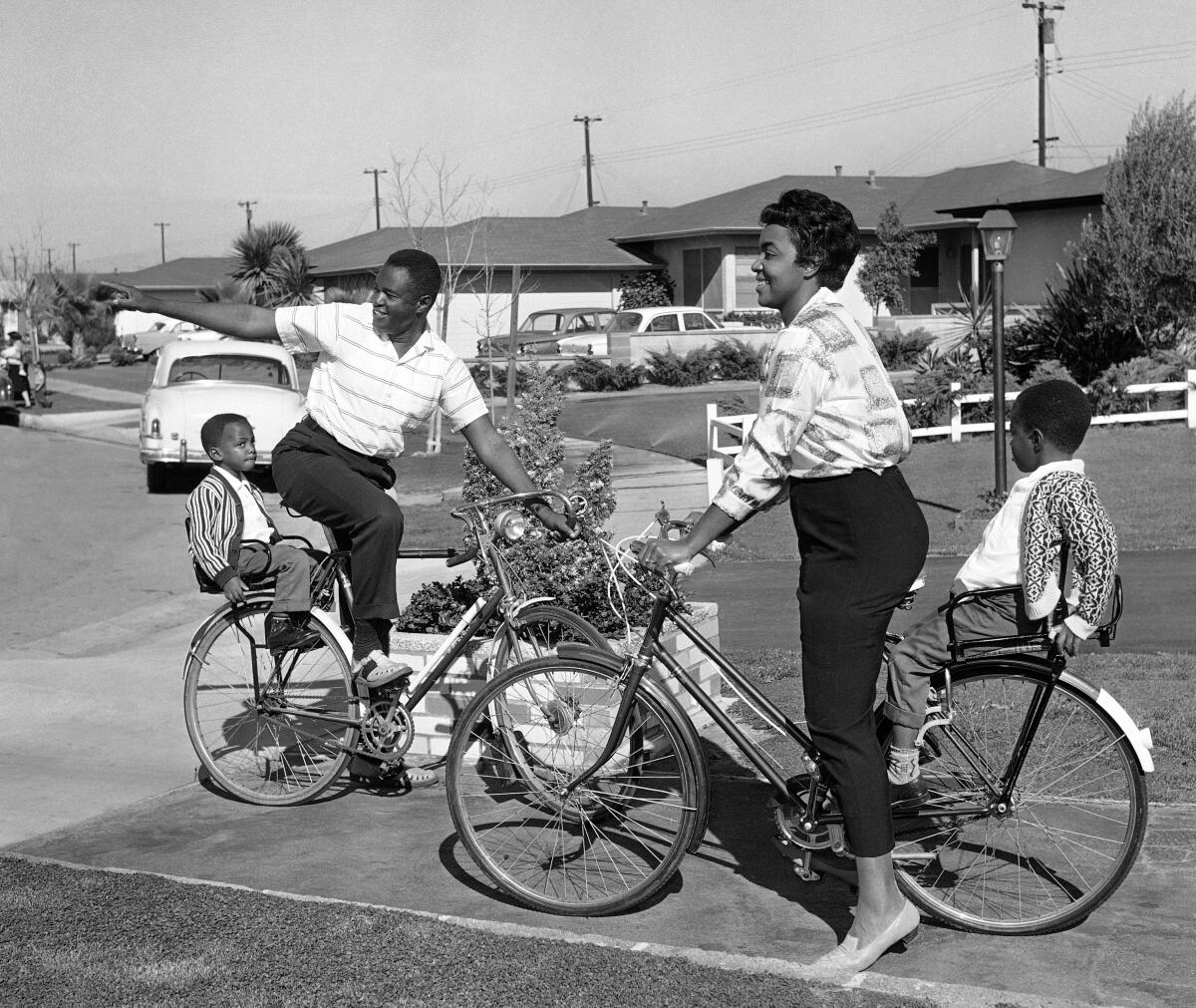 A family of four on bicycles in Gardena in 1962.