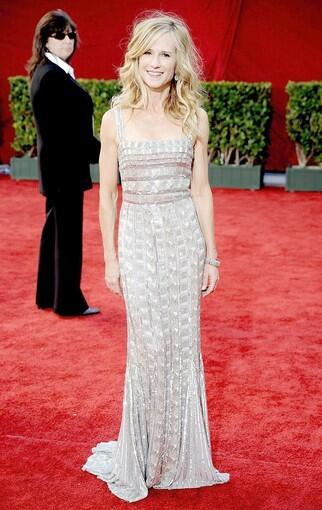 "Saving Grace" star Holly Hunter looked sexy chic in a silver crystal-crusted Emmy gown by Georges Hobeika. What is she, a size 000? She could practically wear Barbie doll clothing.