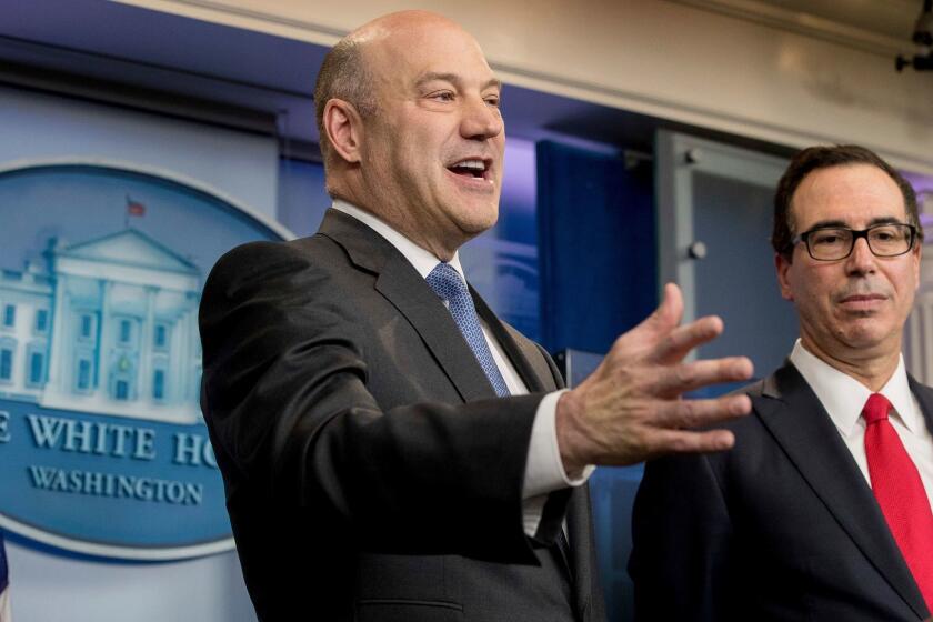 National Economic Director Gary Cohn, left, accompanied by Treasury Secretary Steve Mnuchin, right, speaks in the briefing room of the White House in Washington, Wednesday, April 26, 2017, where they discussed President Donald Trump tax proposals. (AP Photo/Andrew Harnik)