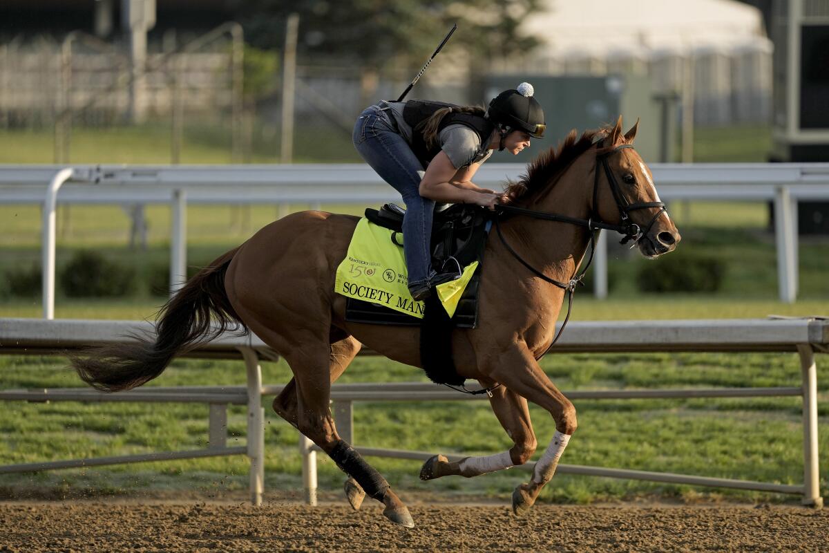 Kentucky Derby entrant Society Man works out at Churchill Downs on Wednesday.