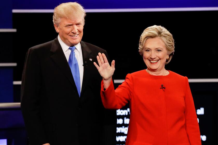 Donald Trump and Hillary Clinton are introduced during the presidential debate at Hofstra University in Hempstead, N.Y. on Monday.