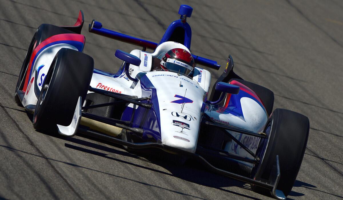 IndyCar driver Mikhail Aleshin takes a practice lap at Auto Club Speedway on Friday.