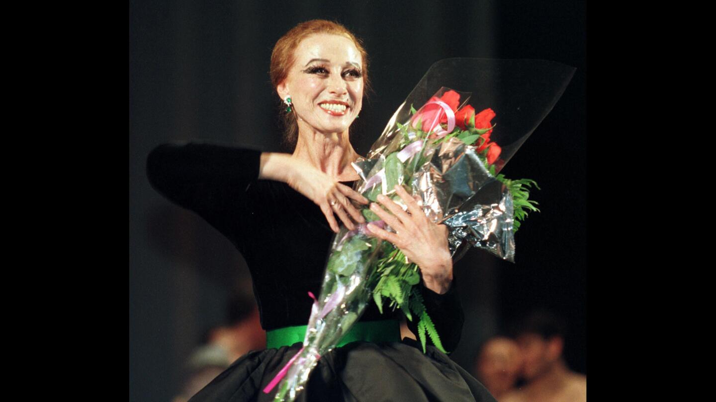 Maya Plisetskaya receives an ovation after a ballet performance at Zhovtnevy Palace in Kiev, Ukraine in 1998.