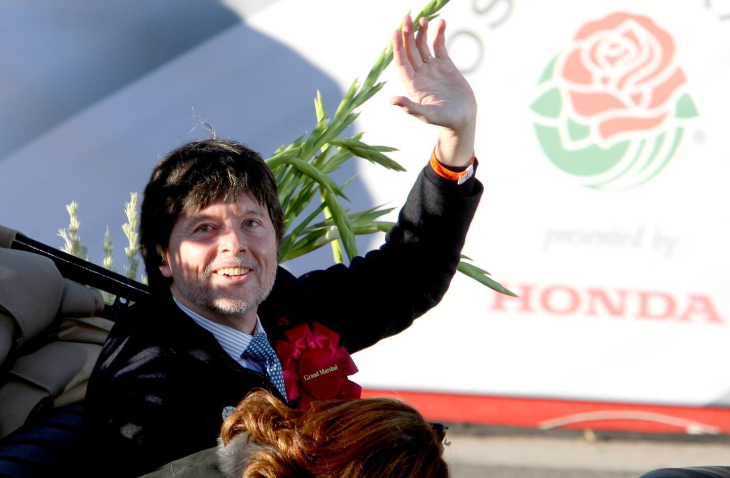 The 2016 Tournament of Roses Grand Marshal Ken Burns heads down Orange Grove Avenue during the 2016 Rose Parade in Pasadena on Friday, Jan. 1, 2016.