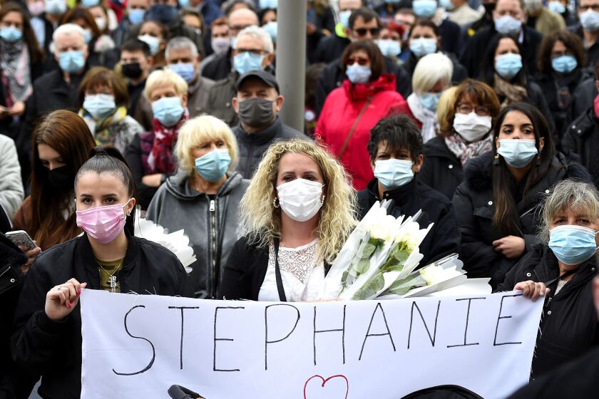 People take part in a silent march in Hayange, eastern France, on May 26, 2021, to pay tribute to Stephanie, a 22-year-old woman who was killed in the street in the night of May 23 to May 24, 2021 in Hayange. - Stephanie's companion, a 23-year-old man of Serbian origin, was arrested for her alleged murder. (Photo by JEAN-CHRISTOPHE VERHAEGEN / AFP) (Photo by JEAN-CHRISTOPHE VERHAEGEN/AFP via Getty Images)