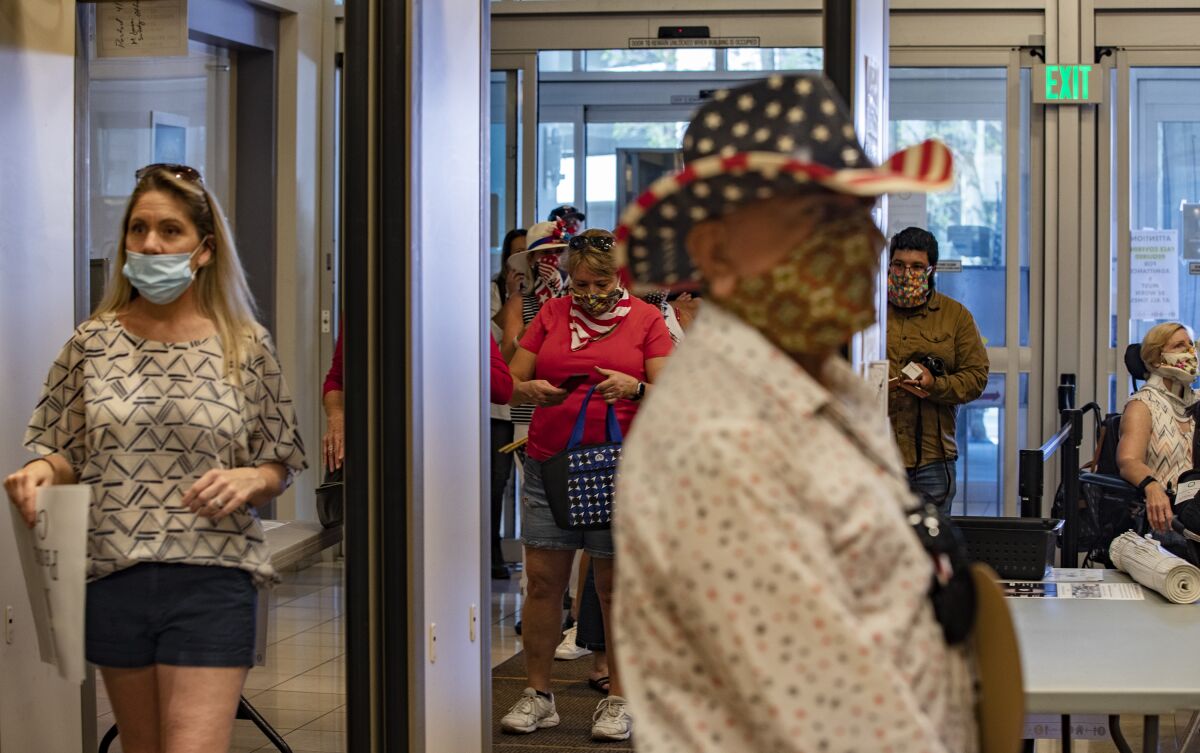 Spectators enter the Riverside County Administrative Center during the Board of Supervisors meeting on May 5.