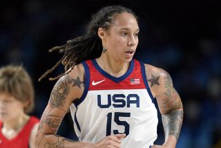 FILE - Brittney Griner (15) runs up court during women's basketball gold medal game against Japan at the 2020 Summer Olympics