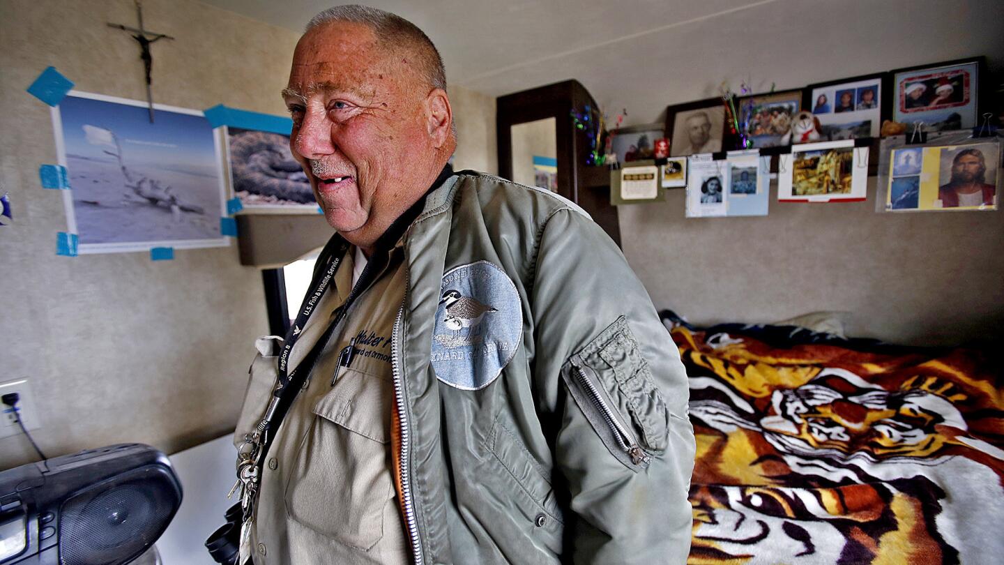 Walter Fuller inside his modest trailer. He has been working for 17 years to preserve Ormond Beach Wetlands in Oxnard.