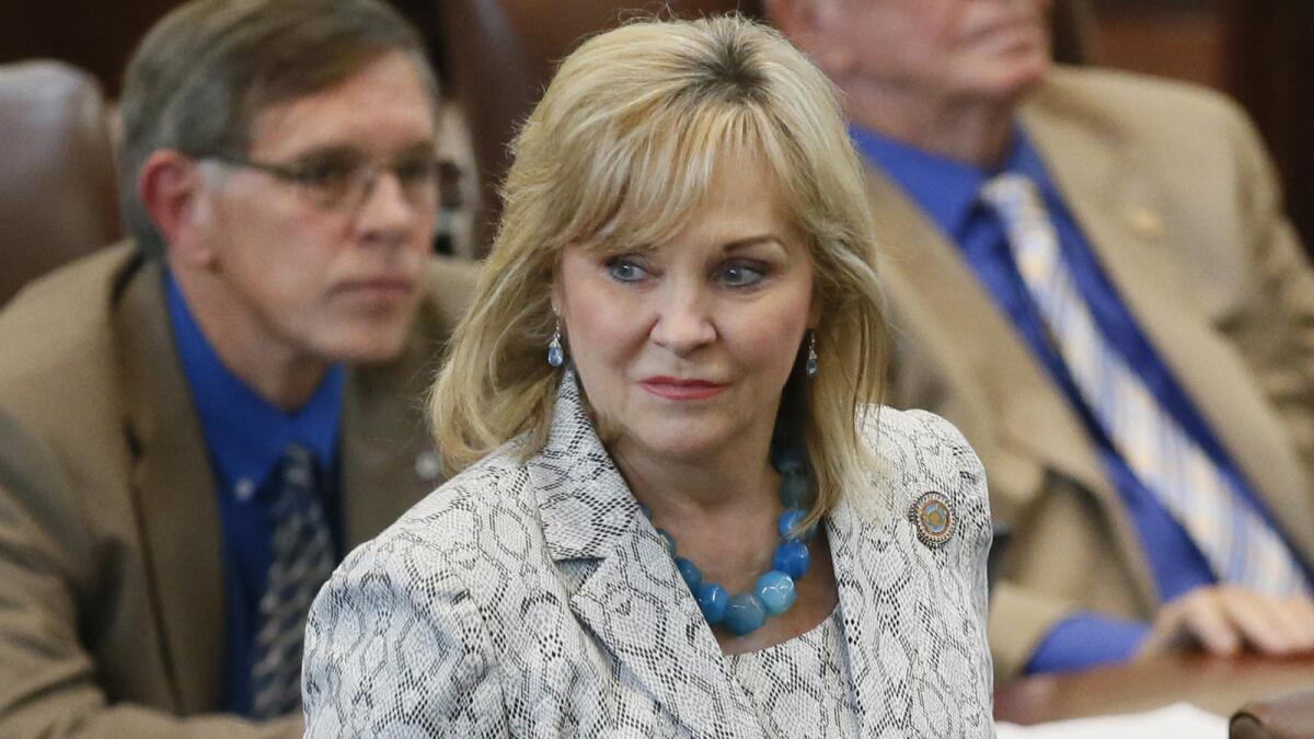 Oklahoma Gov. Mary Fallin on the floor of the Oklahoma House in Oklahoma City.