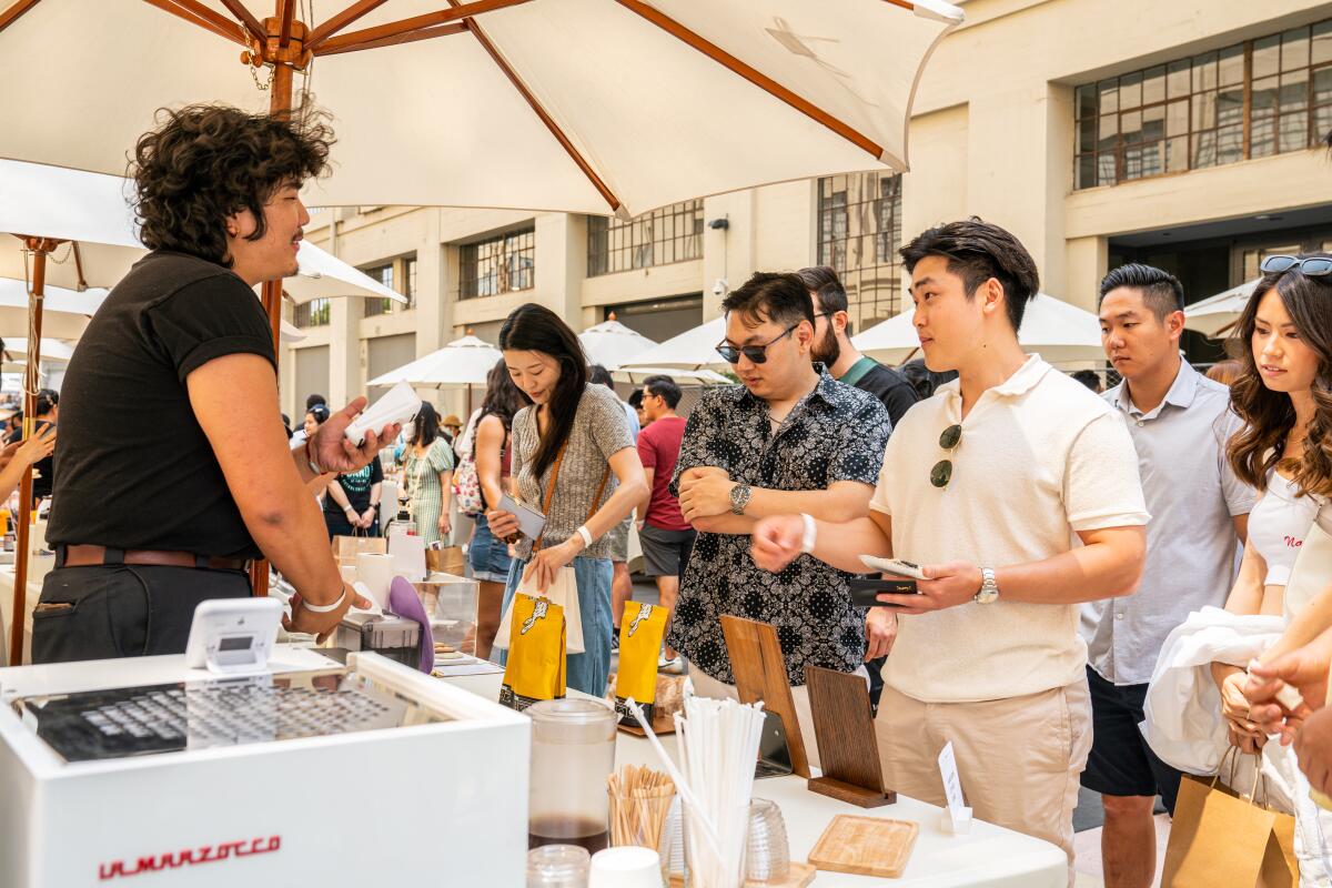 People shopping at an outdoor market