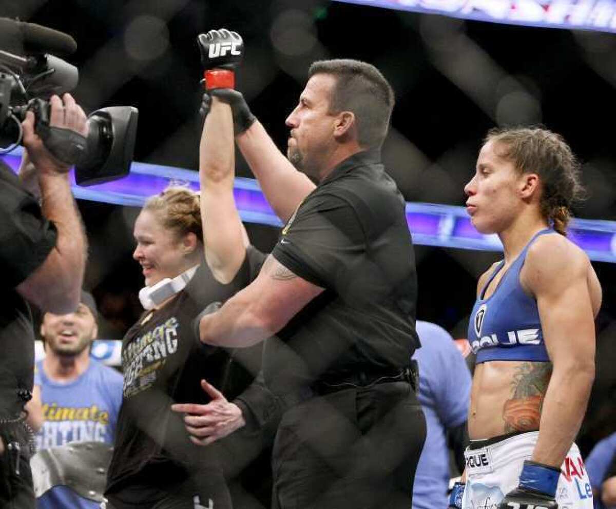 Ronda Rousey, left, is set to be a coach on "The Ultimate Fighter," a TV show on FX.