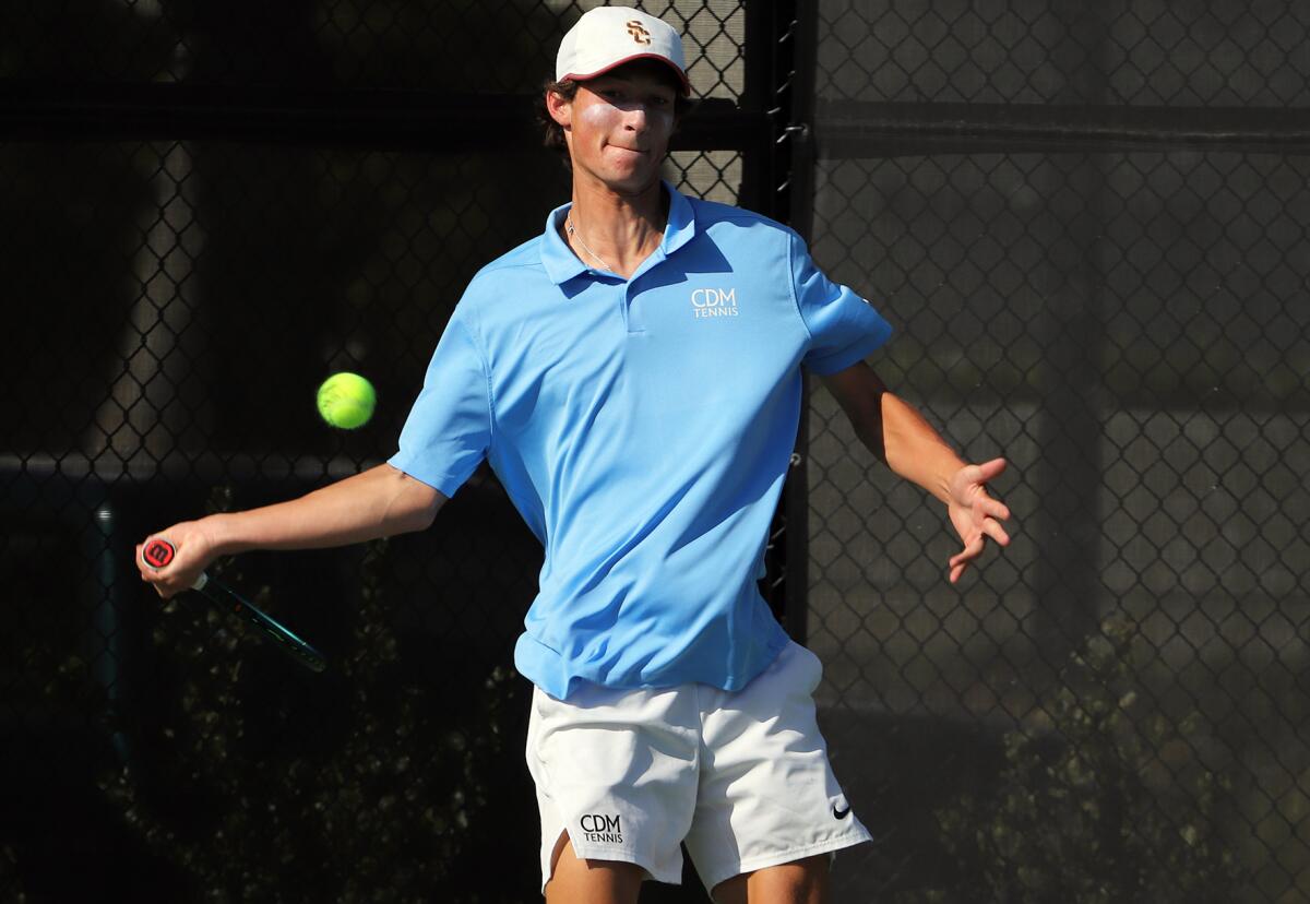 Corona del Mar No. 1 singles player Niels Hoffmann plays in Redlands.