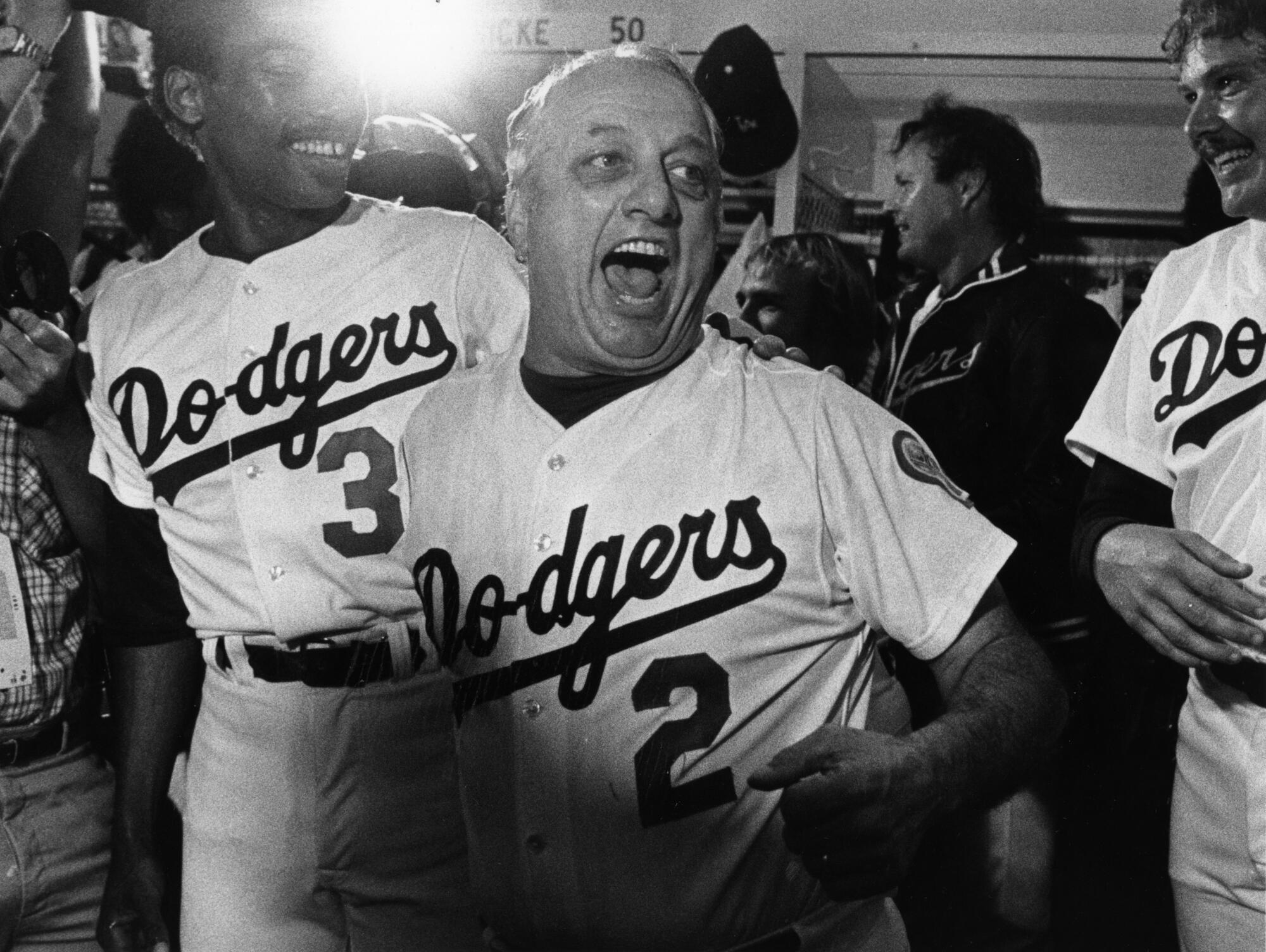 Dodgers manager Tommy Lasorda celebrates in 1981.