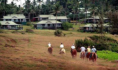 A trail ride lets guests play paniolo, or cowboy, near the cottages at the remodeled Hotel Hana-Maui.