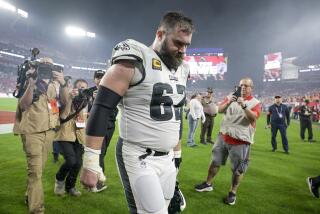Philadelphia Eagles center Jason Kelce walks off the field following an NFL wild-card playoff football game against the Tampa Bay Buccaneers, Monday, Jan. 15, 2024, in Tampa, Fla. The Buccaneers won 32-9. (AP Photo/Phelan M. Ebenhack)
