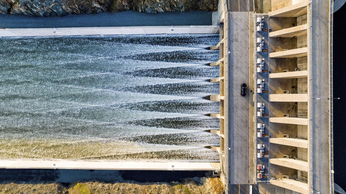 Water flows through the Oroville Spillway at Lake Oroville.