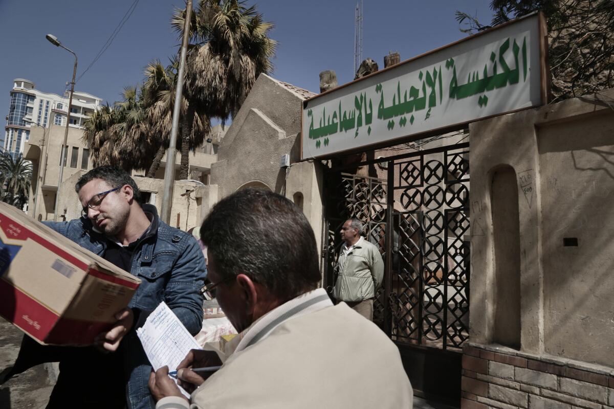 A truck loaded with goods for Egyptian Christian families who fled El Arish arrives at the Evangelical Church in Ismailia, 75 miles east of Cairo.