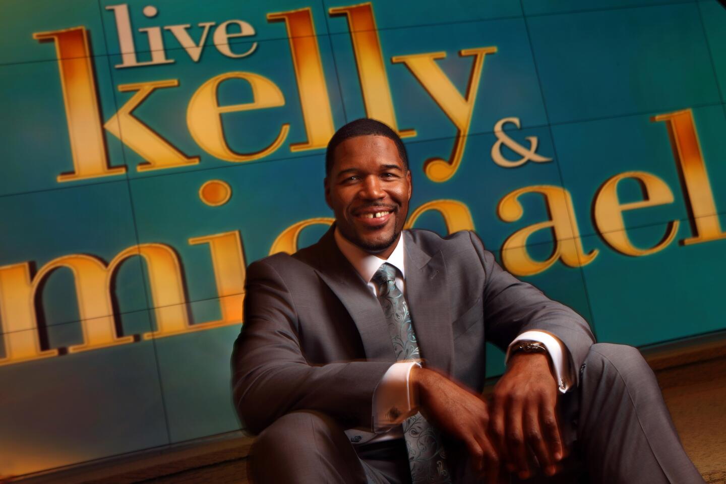 Michael Strahan, a former NFL defensive lineman and Super Bowl champion, is now the cohost of "Live," taking the place of the venerable Regis Philbin.