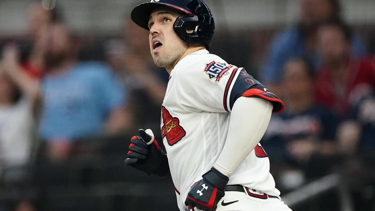 Atlanta Braves' Jorge Soler reacts after hitting a double during the  seventh inning of the team's baseball game against the Cincinnati Reds on  Tuesday, Aug. 10, 2021, in Atlanta. (AP Photo/John Bazemore