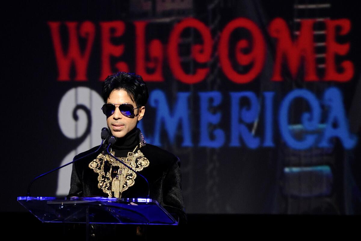 Musician Prince holds a news conference at New York's Apollo Theater in October 2010.