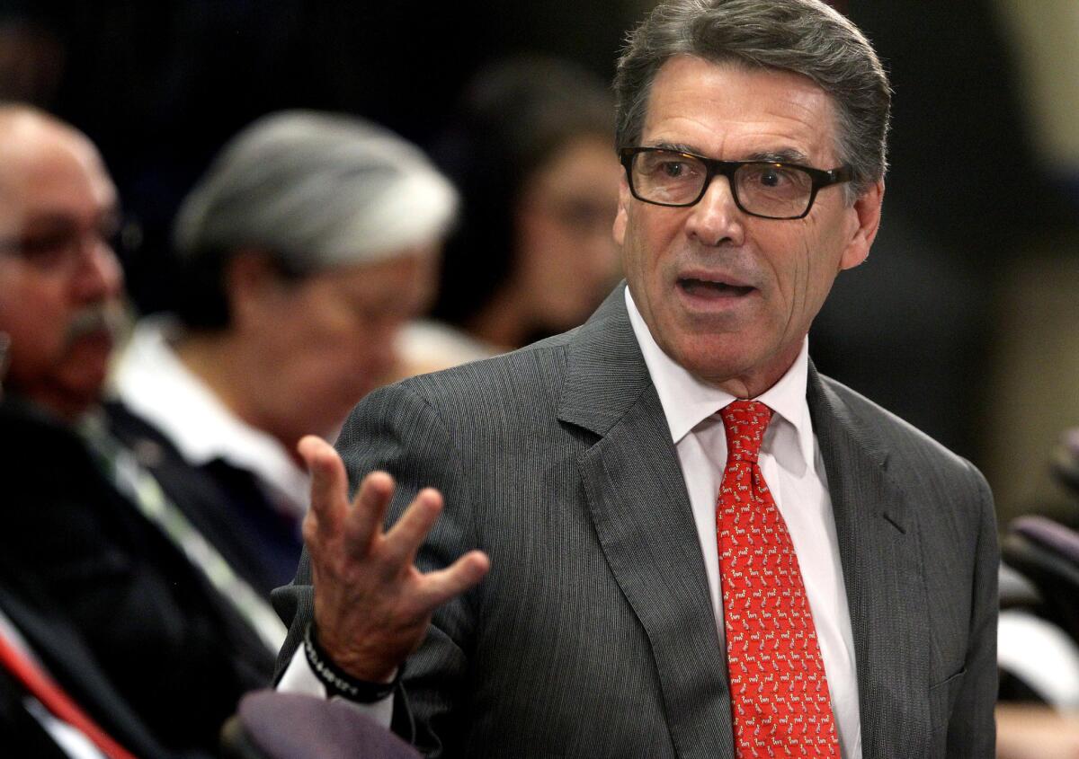 Texas Gov. Rick Perry talks to members of the U.S. House Committee on Homeland Security about the immigration crisis.