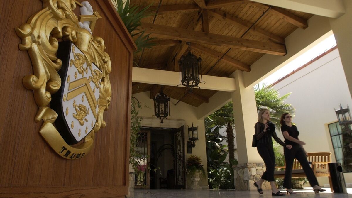 Visitors walked past the front entrance of the Trump National Golf Club -- Los Angeles. A measure will appear on the November ballot in Rancho Palos Verdes requiring raises and panic buttons for workers at the club and at the nearby Terranea resort.