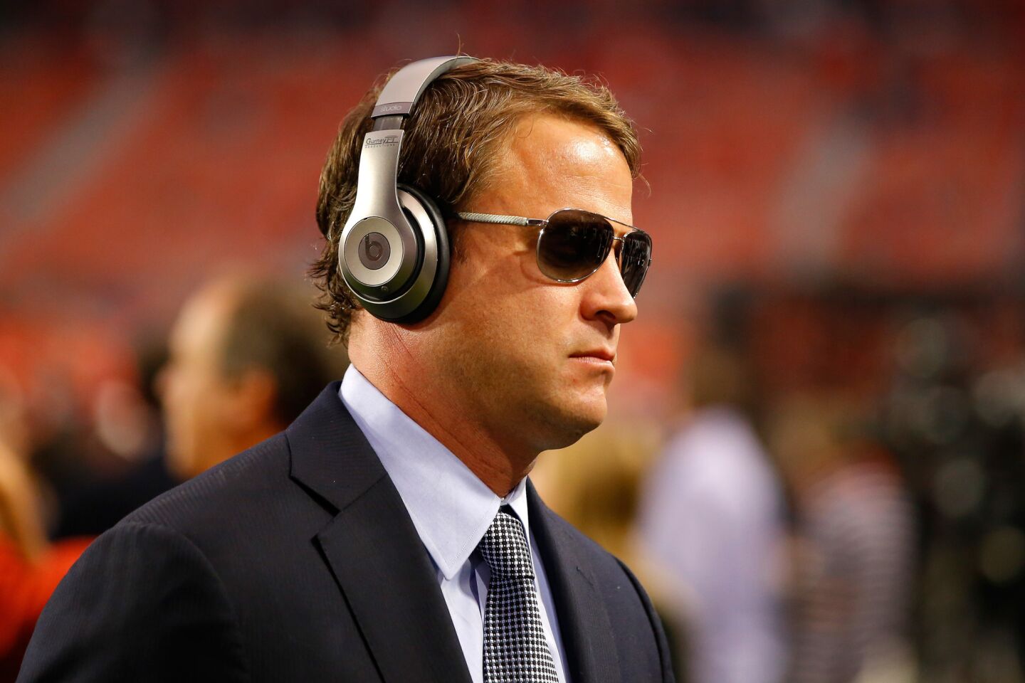 Alabama offensive coordinator Lane Kiffin walks on the field before the 2016 College Football Playoff championship game against Clemson.