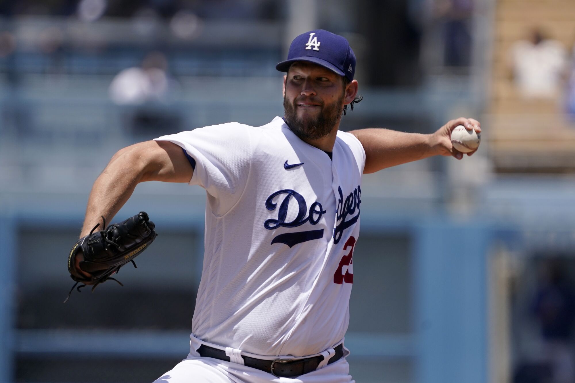 Dodgers starting pitcher Clayton Kershaw delivers against the San Francisco Giants at Dodger Stadium.