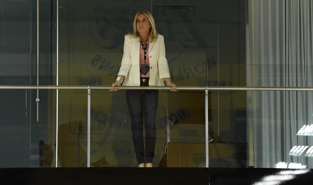 Jeanie Buss, co-owner and governor of the Lakers, looks from a balcony before the start of a news conference last year to introduce Anthony Davis at the team's training facility in El Segundo on July 13, 2019.