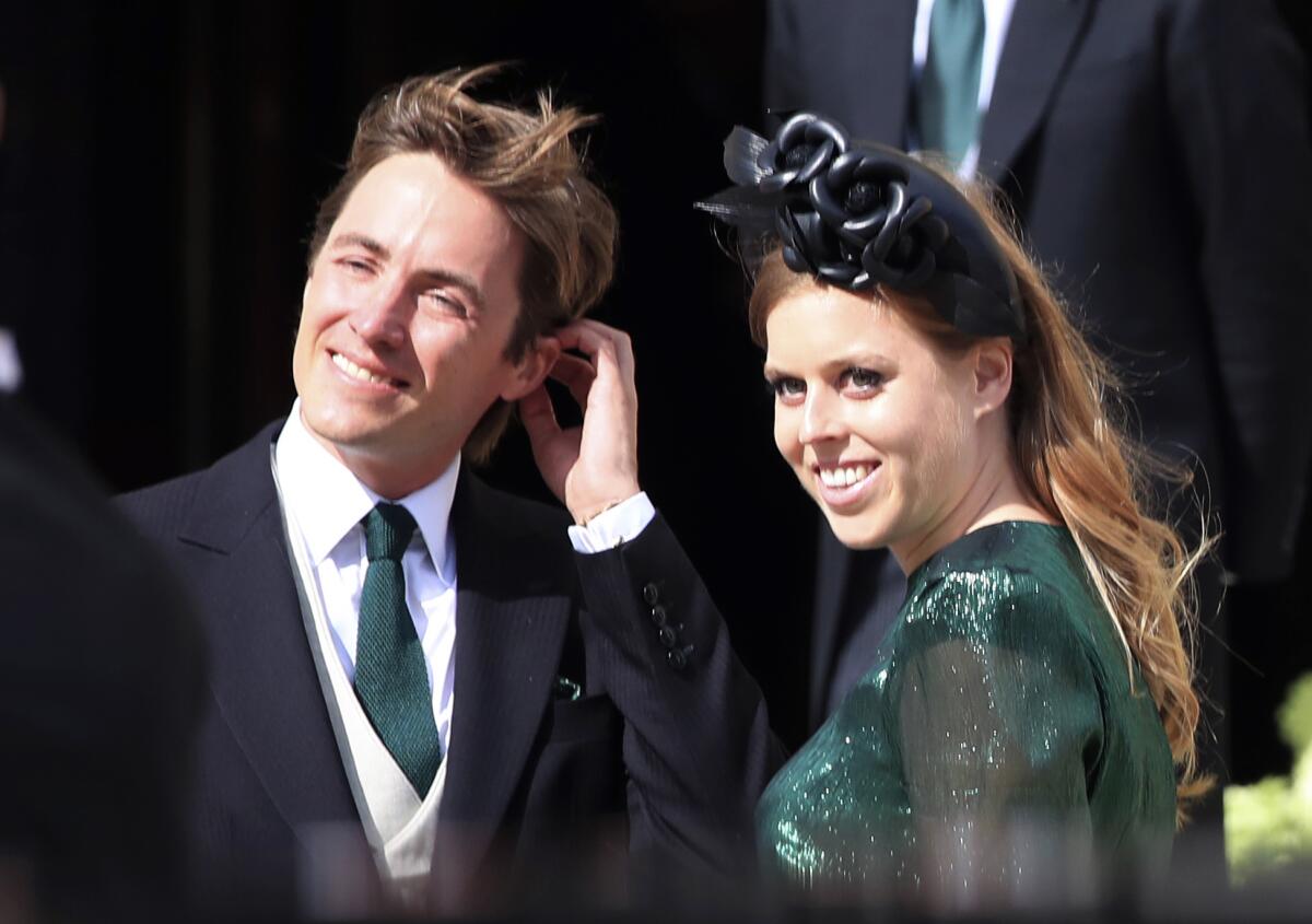 Britain's Princess Beatrice with her fiance, Edoardo Mapelli Mozzi, in August 2019.