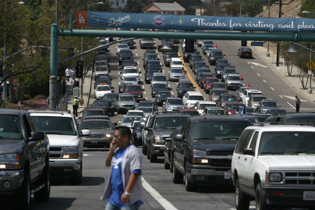 The Dodgers have raised the price of parking from $10 to $15 in an effort to reduce traffic to and from Dodger Stadium on game day.