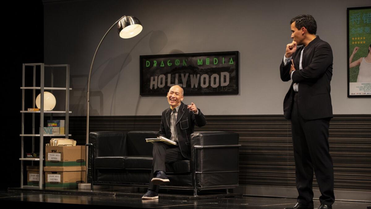 Francis Jue as writer David Henry Hwang, left, with Conrad Ricamora as producer Xue Xing in the mini play that sets up the musical in "Soft Power."