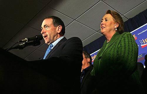 Huckabee with wife