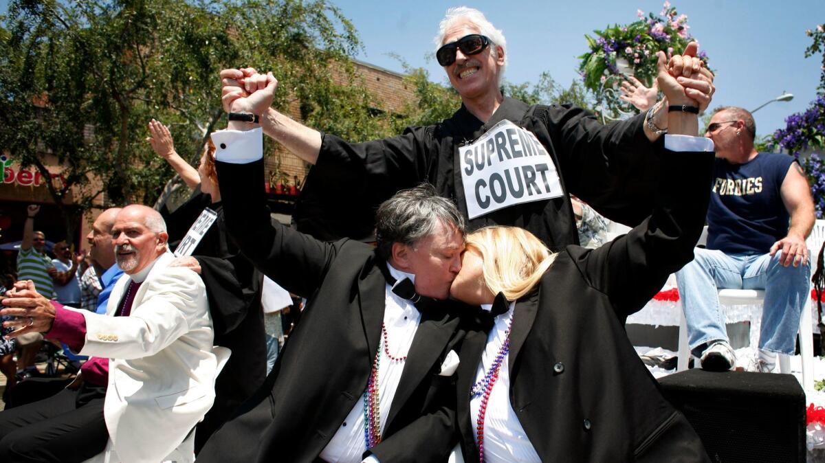 Robin Tyler and Diane Olsen celebrate the Supreme Court decision to legalize gay marriage by riding on a wedding float together on June 8, 2008. (Barbara Davidson / Los Angeles Times)