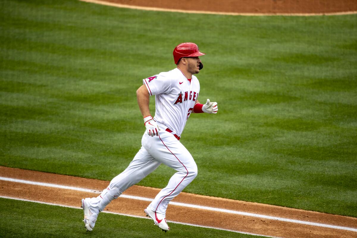 Los Angeles Angels center fielder Mike Trout (27) runs the bases after hitting a homer 