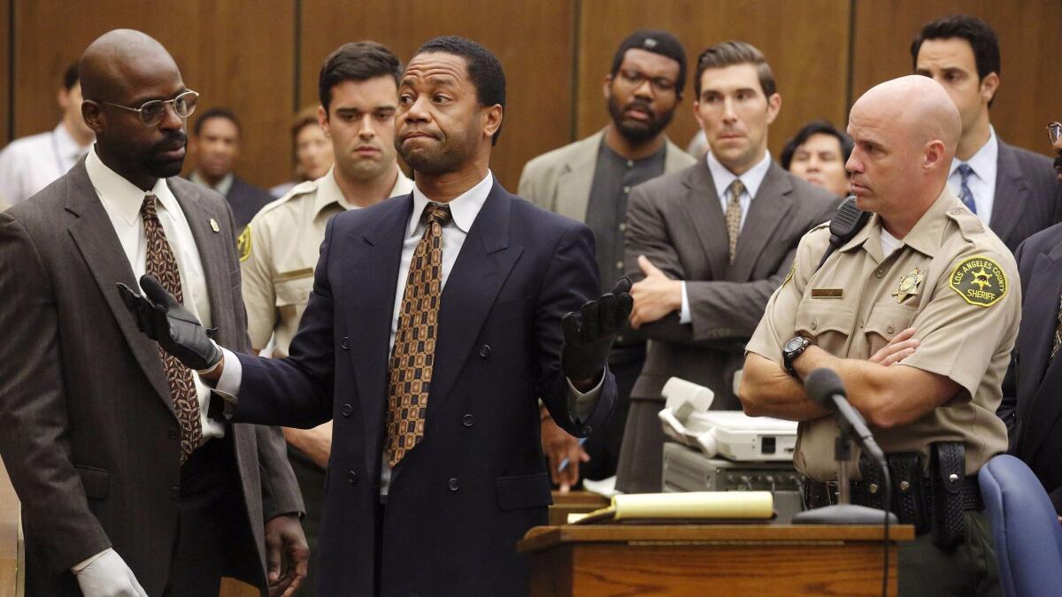 Sterling K. Brown portrays Christopher Darden, left, and Cuba Gooding, Jr. portrays O.J. Simpson in a scene from "The People v O.J. Simpson: American Crime Story."