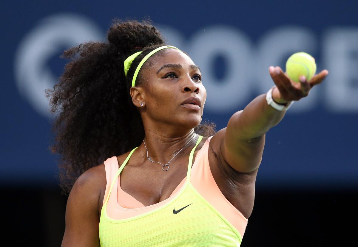 Serena Williams serves against Andrea Petkovic during Day 4 of the Rogers Cup in Toronto.