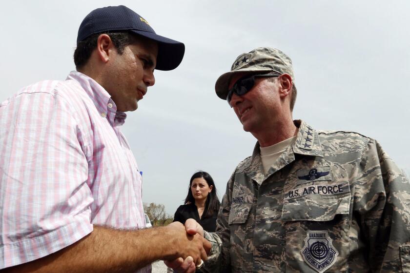 Mandatory Credit: Photo by THAIS LLORCA/EPA-EFE/REX/Shutterstock (9087940f) Ricardo Rossello and Joseph Lengyel Aftermath of Hurricane Maria in Puerto Rico, Salinas - 27 Sep 2017 Governor of Puerto Rico, Ricardo Rossello (L) greets the head of the US National Guard, General Joseph Lengyel (R) upon his arrival at Camp Santiago, the headquarters of the National Guard of Puerto Rico, from where they will leave to deliver supplies to the victims by the passage of Hurricane Maria, in the municipality of Salinas, Puerto Rico, 27 September 2017. A week after the passage of Hurricane Maria in the Caribbean, the majority of Puerto Rico is still without electricity and half of the residents do not have running water, media reported. Hurricane Maria, which devastated the Caribbean island, is comparable in magnitude to the worst natural disasters in the United States, according to the director of the Federal Emergency Management Agency (Fema) for the Caribbean, Alejandro of the Campa. ** Usable by LA, CT and MoD ONLY **