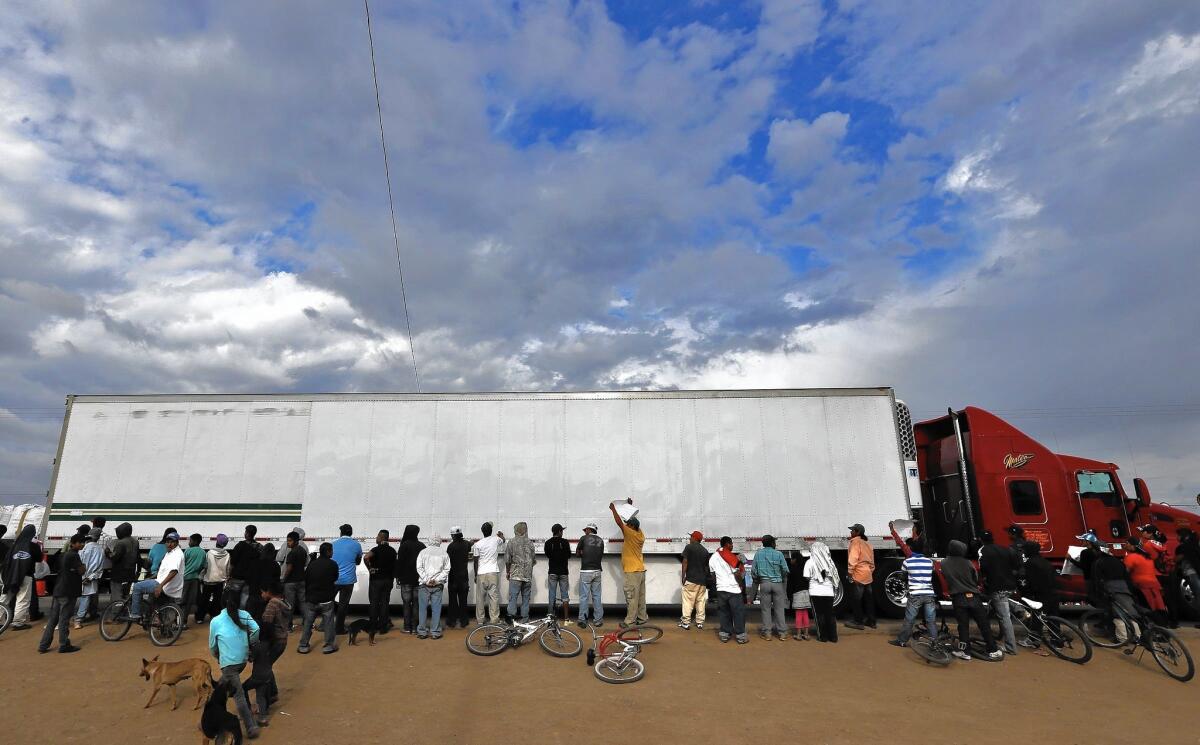 Farmworkers call for better wages at Mexican export farms during a protest March 19 in the Baja California town of Colonet.