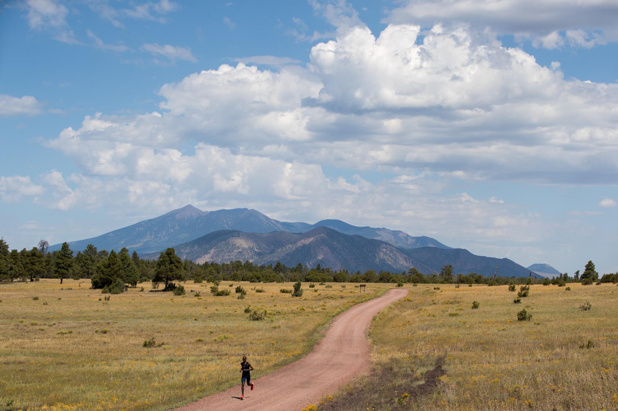 Distance runner Mo Farah takes part in a training session near Flagstaff in August 2019.