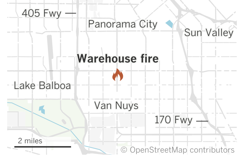 A map shows the location of a warehouse fire in Van Nuys