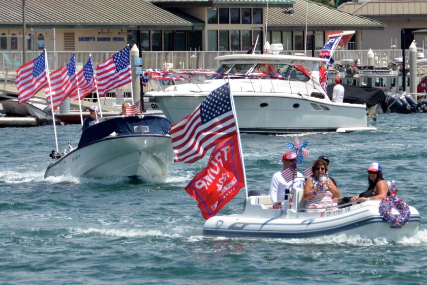 Boats of all sizes were part of the Trumptilla parade Sunday in Newport Harbor.