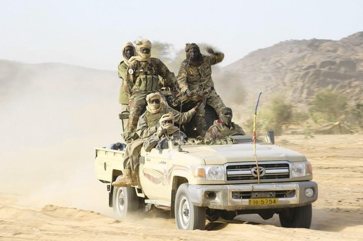 Malian troops patrol in the Ifoghas mountains as part of their joint effort with France to drive out Islamist militants. French officials said it was "probable" that regional Al Qaeda leader Abou Zeid had been killed in an airstrike.