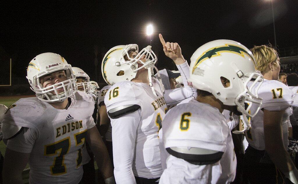 Edison quarterback Griffin O'Connor raises a finger to the sky after beating La Mirada 44-24 in the CIF Southern Section Division 3 championship game on Friday.